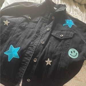 Adult Black Denim Jacket with Blue and Silver Accents. #coedelite #cea